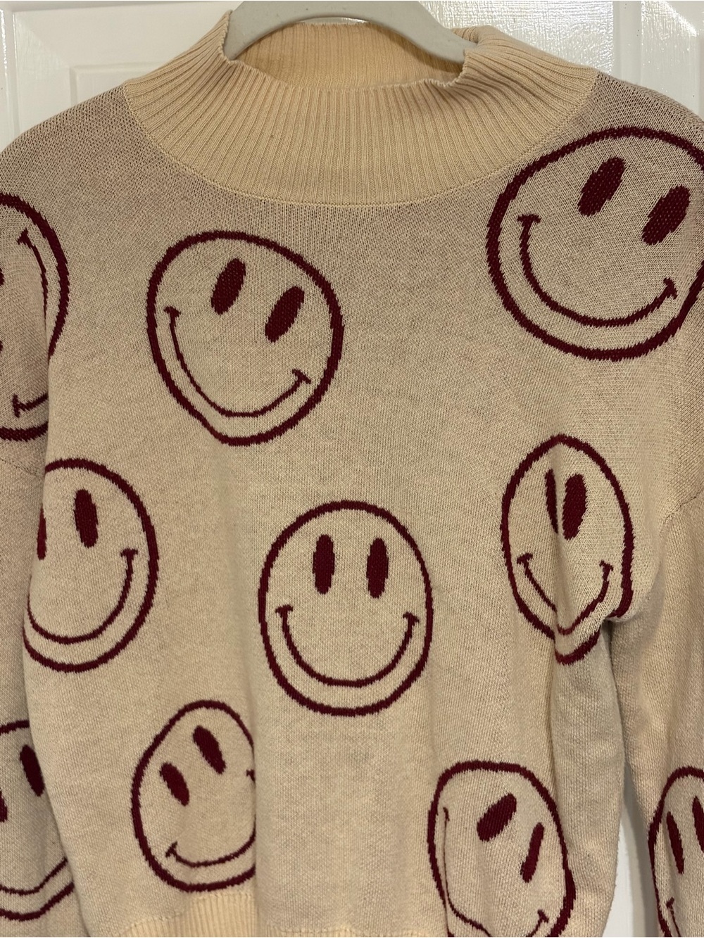 Nikkak Women's Mock-Neck All-Over Maroon Smiley Face Design on Cream Sweater Med